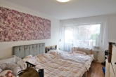 Schlafzimmer - 3-Zimmerwohnung mit eigenem Garten in Rheinkassel!