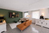 Wohnzimmer - Flexibles Wohnen: Gepflegtes Einfamilienhaus mit Appartement, Terrasse & Garage in Köln Longerich!