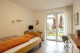 Schlafzimmer - Barrierefreie 2-Zimmer-Wohnung mit sonnigem Garten zur Eigennutzung in Köln Longerich!