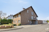 Straßenansicht - Vermietetes, freistehendes Mehrfamilienhaus in Pulheim / Stommelerbusch!