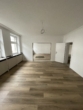 Sanierte 3-Zimmer-Wohnung mit Terrasse und Wintergarten in Grevenbroicher Fußgängerzone - Wohnzimmer